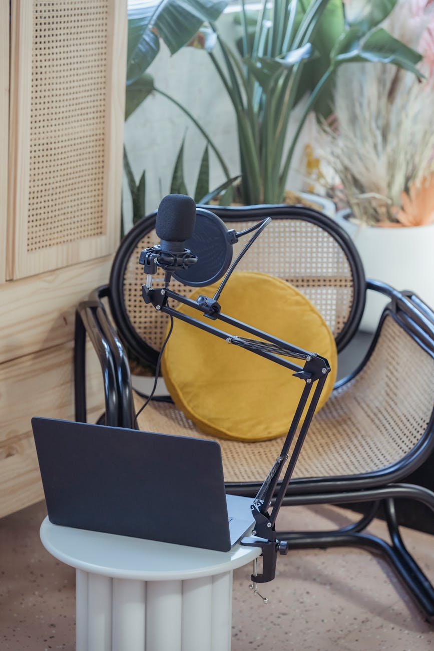 laptop and mic on tripod in studio before recording vlog